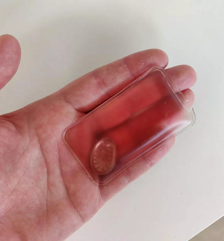 Digital enigma unveiling shocking mystery discoveries that baffled all - #3 What is this small plastic pouch with red gel and a metal disc inside?