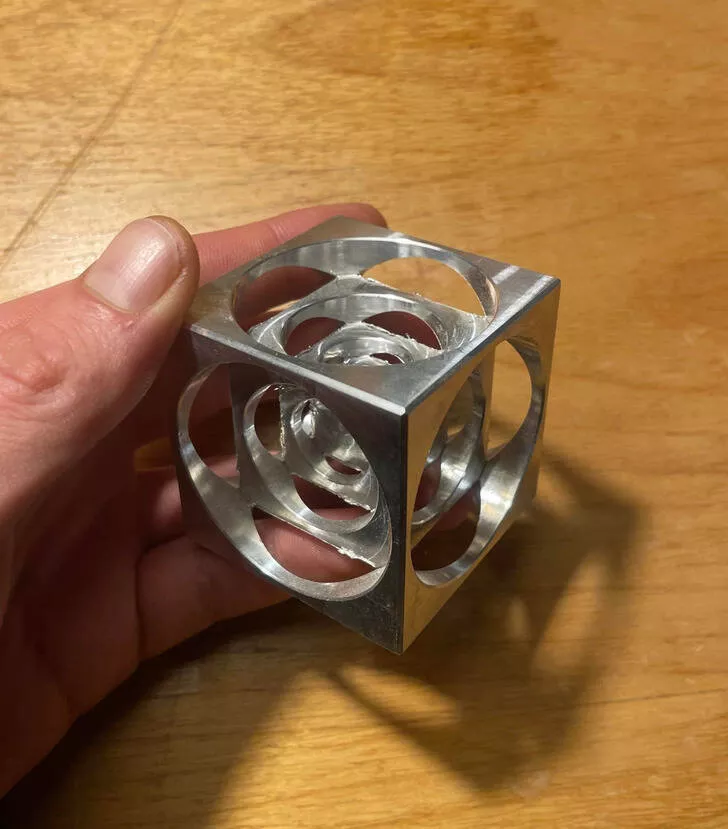 Digital enigma unveiling shocking mystery discoveries that baffled all - #9 What's this aluminum cube with circles featuring additional cubes with circles?