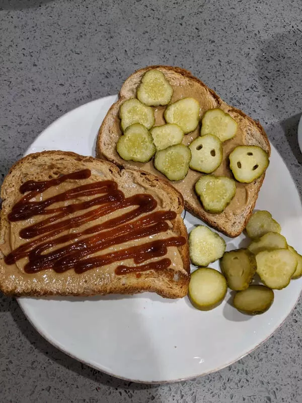 Palate puzzles exploring bizarre food pairings that challenge your taste buds - #1 Peanut butter Sriracha toast, peanut butter pickle toast, and a side of pickles.