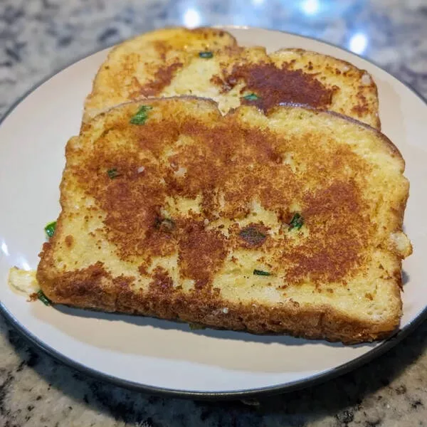 Palate puzzles exploring bizarre food pairings that challenge your taste buds - #15 Was feeling lazy, so I used store-bought sourdough to make savory French toast. Used garlic powder, onion powder, salt, pepper, green onions. Also put Parmesan on one side.