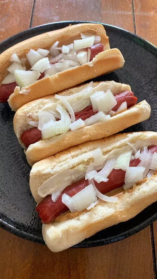 Palate puzzles exploring bizarre food pairings that challenge your taste buds - #7 Hotdog with raw onion and peanut butter.
