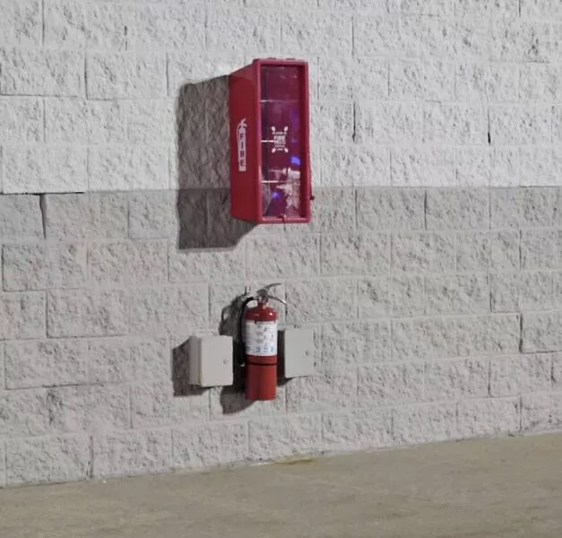 Workplace whimsies unveiling the comedy of errors in ridiculous office mishaps - #10 The worker who mounted this fire extinguisher: