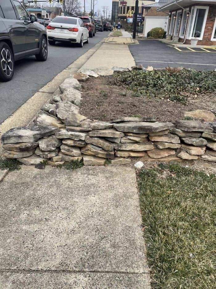Workplace whimsies unveiling the comedy of errors in ridiculous office mishaps - #2 The person who constructed this structure in the middle of the sidewalk: