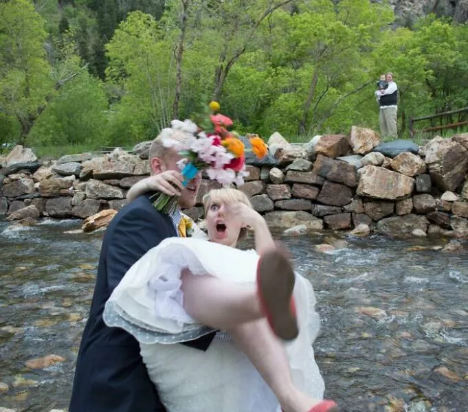 Unveiling impending turmoil photos capturing disaster on the horizon - #6 When my husband thought it was a good idea to pick me up while standing dangerously close to the creek after our wedding