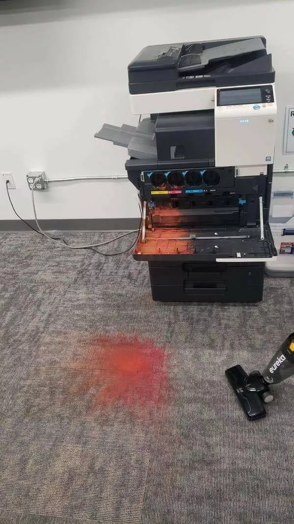 Annoying encounters moments that playfully aggravate - #16 The office printer decided to celebrate Holi a bit early.