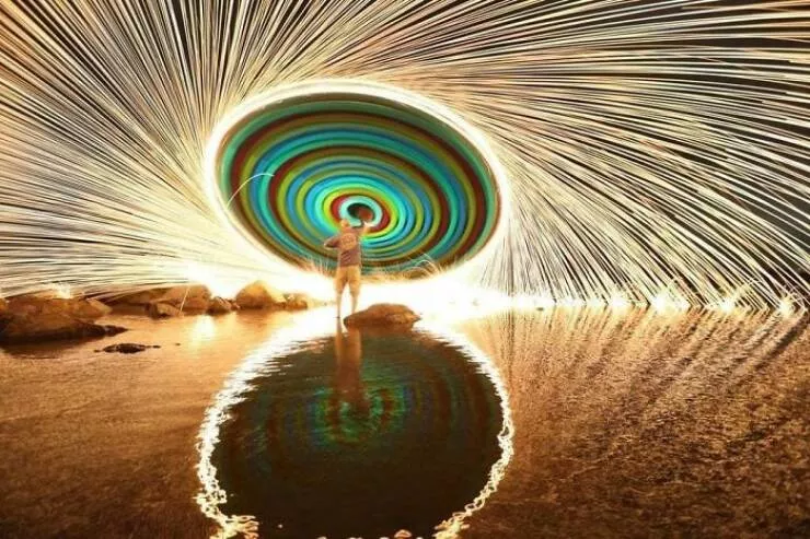 Intriguing discoveries subtly surprising finds that captivate - #16 The captivating result of swinging a string of glow sticks with burning steel wool and capturing a long exposure photo